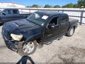 2013 Toyota Tacoma — photo 2 of 15 | VIN 5TFJU4GN6DX036290