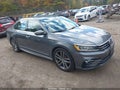 2017 Volkswagen Passat — photo 1 of 16 | VIN 1VWDT7A34HC001055