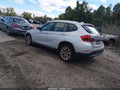 2014 BMW X1 — photo 3 of 15 | VIN WBAVL1C58EVY14706