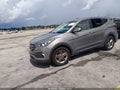 2018 Hyundai Santa Fe — photo 2 of 17 | VIN 5NMZTDLB7JH073662