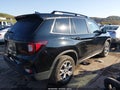 2023 Honda Passport — photo 4 of 12 | VIN 5FNYF8H65PB016828