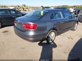 2013 Volkswagen Jetta — photo 4 of 17 | VIN 3VWLX7AJ7DM395139