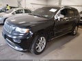 2014 Jeep Grand Cherokee — photo 2 of 16 | VIN 1C4RJFJT3EC106559
