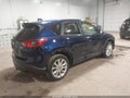 2014 Mazda CX-5 — photo 4 of 16 | VIN JM3KE4DY9E0319882