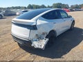 2026 Tesla Model Y — photo 4 of 18 | VIN 7SAYGDEE2TF332640