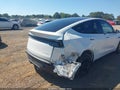 2026 Tesla Model Y — photo 6 of 18 | VIN 7SAYGDEE2TF332640