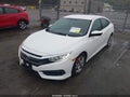 2017 Honda Civic — photo 2 of 16 | VIN 19XFC2F54HE215934