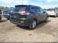 2015 Nissan Rogue — photo 4 of 11 | VIN 5N1AT2MT9FC805543
