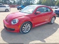 2013 Volkswagen Beetle — photo 2 of 11 | VIN 3VWJL7AT4DM623019