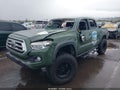 2021 Toyota Tacoma — photo 2 of 16 | VIN 5TFCZ5AN0MX246960