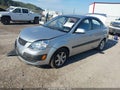 2009 Kia Rio — photo 2 of 16 | VIN KNADE223696495687