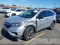2015 Honda CR-V — photo 2 of 16 | VIN 5J6RM4H35FL119827