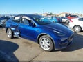 2023 Tesla Model Y — photo 1 of 19 | VIN 7SAYGDEE3PF902084