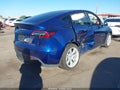 2023 Tesla Model Y — photo 4 of 19 | VIN 7SAYGDEE3PF902084
