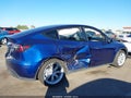 2023 Tesla Model Y — photo 6 of 19 | VIN 7SAYGDEE3PF902084
