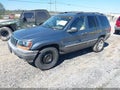 2002 Jeep Grand Cherokee — photo 2 of 11 | VIN 1J4GW48N12C277434