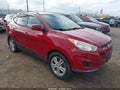 2011 Hyundai Tucson — photo 1 of 12 | VIN KM8JUCAC5BU142516