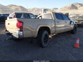 2020 Toyota Tacoma — photo 4 of 15 | VIN 3TMDZ5BNXLM080194