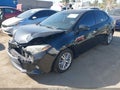 2014 Toyota Corolla — photo 2 of 16 | VIN 5YFBURHE9EP129398