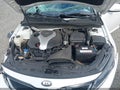 2014 Kia Optima — photo 10 of 17 | VIN 5XXGR4A69EG289187