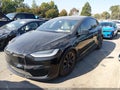 2022 Tesla Model X — photo 2 of 19 | VIN 7SAXCAE54NF345222