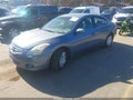 2012 Nissan Altima — photo 2 of 12 | VIN 1N4AL2APXCN403466