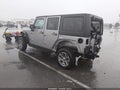 2018 Jeep Wrangler Unlimited — photo 3 of 17 | VIN 1C4HJWFG6JL911845