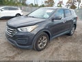 2016 Hyundai Santa Fe — photo 2 of 16 | VIN 5XYZTDLB9GG378938