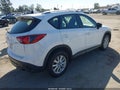 2013 Mazda CX-5 — photo 4 of 11 | VIN JM3KE2BE5D0128956