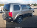 2012 Honda Pilot — photo 4 of 16 | VIN 5FNYF4H57CB031972