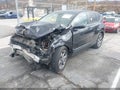 2017 Honda CR-V — photo 2 of 17 | VIN 5J6RW1H88HL006896