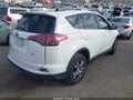 2018 Toyota RAV4 — photo 4 of 16 | VIN JTMZFREV1JJ737895