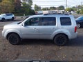 2011 Honda Pilot — photo 14 of 16 | VIN 5FNYF4H94BB097512