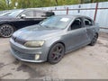 2012 Volkswagen Jetta — photo 2 of 17 | VIN 3VW567AJ0CM450119