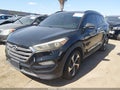 2016 Hyundai Tucson — photo 2 of 16 | VIN KM8J3CA2XGU057236