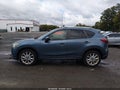 2014 Mazda CX-5 — photo 14 of 16 | VIN JM3KE2DY2E0422520