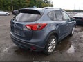 2014 Mazda CX-5 — photo 4 of 16 | VIN JM3KE2DY2E0422520