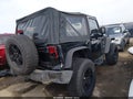 2010 Jeep Wrangler — photo 4 of 11 | VIN 1J4AA2D11AL228664