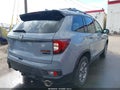 2023 Honda Passport — photo 4 of 16 | VIN 5FNYF8H66PB000783