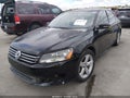 2012 Volkswagen Passat — photo 2 of 11 | VIN 1VWBP7A38CC083571