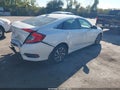 2018 Honda Civic — photo 4 of 17 | VIN 19XFC2F73JE040504