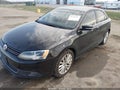 2014 Volkswagen Jetta — photo 2 of 17 | VIN 3VWL17AJ0EM384387