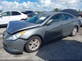 2013 Hyundai Sonata — photo 2 of 11 | VIN 5NPEB4AC8DH770004