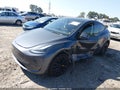 2023 Tesla Model Y — photo 2 of 17 | VIN 7SAYGDEE0PA165214