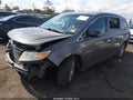 2011 Honda Odyssey — photo 2 of 16 | VIN 5FNRL5H62BB007928