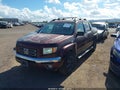 2007 Honda Ridgeline — photo 2 of 11 | VIN 2HJYK16577H515827