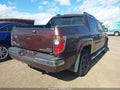 2007 Honda Ridgeline — photo 4 of 11 | VIN 2HJYK16577H515827