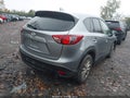 2014 Mazda CX-5 — photo 4 of 15 | VIN JM3KE2CY9E0402976