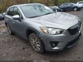 2014 Mazda CX-5 — photo 6 of 15 | VIN JM3KE2CY9E0402976
