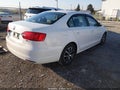 2014 Volkswagen Jetta — photo 4 of 16 | VIN 3VWLL7AJXEM296795